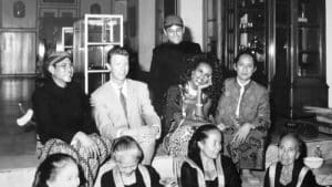 David Bowie (second left) and his wife Iman sit as they watch a Suronan ceremony at Mangkunegaran Palace in 1991, accompanied by businessmen Setiawan Djody (far right) and Yapto Soerjosoemarno (behind). (Mangkunegaran Palace file photo)